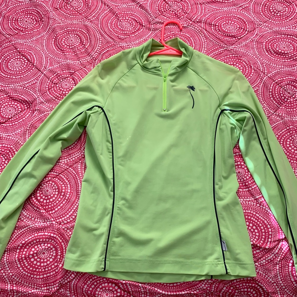 A workout light green sweater .